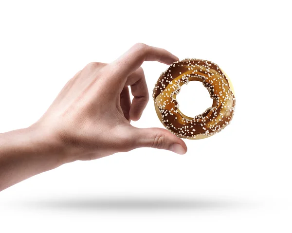 Hand hält Donut — Stockfoto