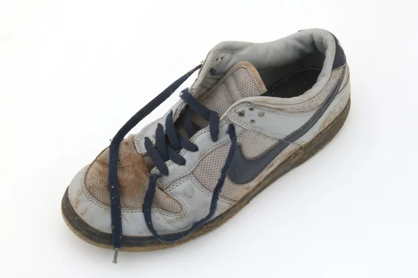 Close up of old warn out trainer shoe — Stock Photo, Image