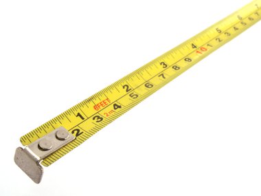 Yellow tape measure on a white background. clipart