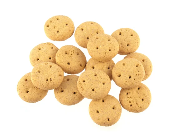 Round dog biscuits on a white background. — Stock Photo, Image