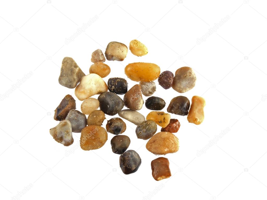 Polished stones and pebbles on a white background.