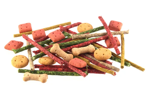 Close-up foto van geassorteerde gevormde hond koekjes en chews — Stockfoto