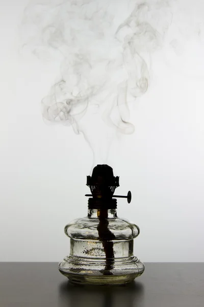 Oil lamp with smoke — Stock Photo, Image