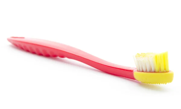 Используемая зубная щетка — стоковое фото