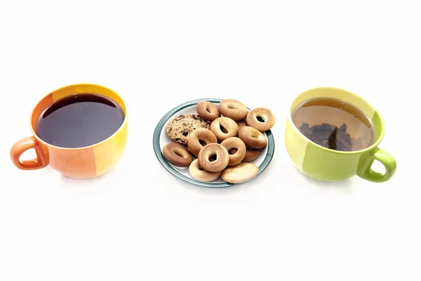 Tazas con té y galletas — Foto de Stock