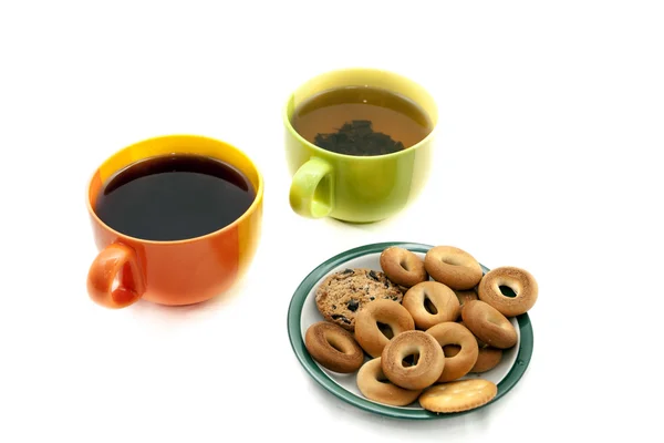 Tazas con té y galletas — Foto de Stock