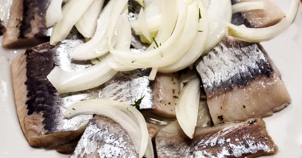 Herring cut with onions — Stock Photo, Image