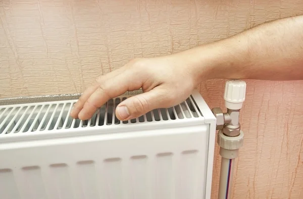 Check of heating of a radiator — Stock Photo, Image