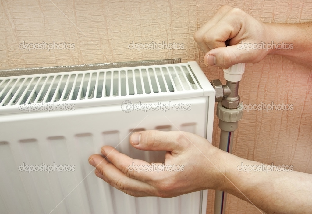 Check of heating of a radiator — Stock Photo © gorvik #14145795