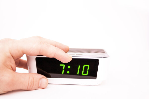 Contact of a hand of an alarm clock