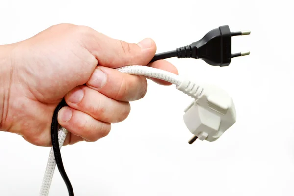 Electric a plug in a hand — Stock Photo, Image