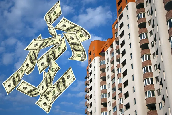 Falling notes of US dollar against  the inhabited high-floor hou — Stock Photo, Image