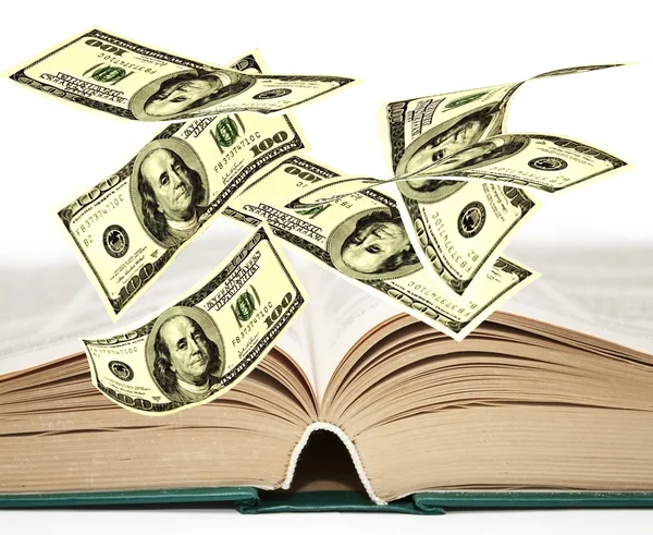 Falling notes of US dollar on the developed book — Stock Photo, Image