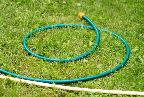 Hose for watering of lawn water — Stock Photo, Image