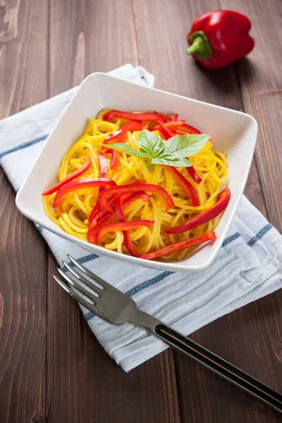 Spaghetti con zafferano e peperone - Spaghetti with saffron and Royalty Free Stock Images