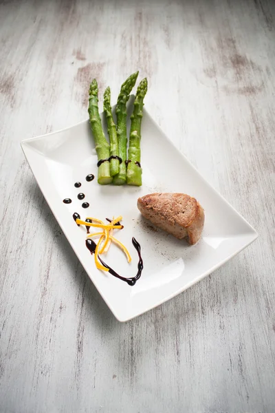 Fillet of pork with asparagus — Stock Photo, Image