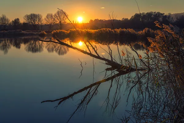 Reflexão do pôr do sol — Fotografia de Stock