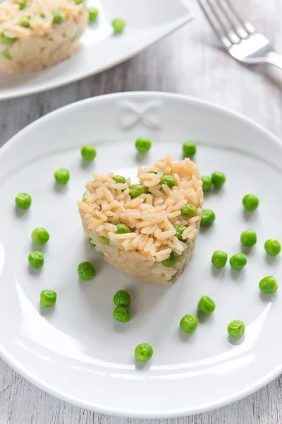 Risotto with peas — Stock Photo, Image
