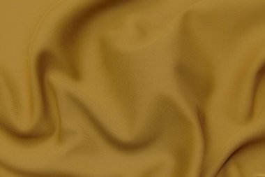 Turuncu ya da gri kumaş ya da kumaşın yakın çekim dokusu aynı renkte. Doğal pamuk, ipek, yün veya keten kumaş dokusu. Kumaş bezi arkaplanı.