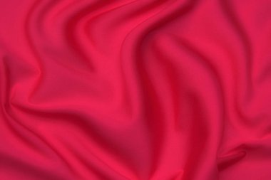 Doğal kırmızı ya da pembe kumaş ya da kumaşın yakın çekim dokusu aynı renkte. Doğal pamuk, ipek, yün veya keten kumaş dokusu. Kırmızı ve turuncu tuval arkaplan.