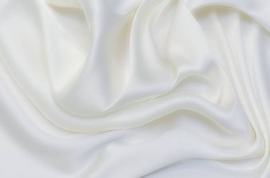 Doku, arka plan, desen. Beyaz, fildişi, pamuk ya da yün kumaş dokusu. Güzel kumaş deseni.