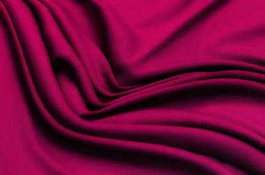 Doku, arka plan, desen. Kırmızı ipek, pamuk ya da yün kumaş. Güzel kumaş deseni.