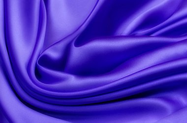 Doğal mavi kumaş ya da kumaşın yakın çekim dokusu aynı renkte. Doğal pamuk, ipek ya da yün kumaş dokusu. Mavi tuval arkaplanı.