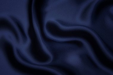 Doğal mavi kumaş ya da kumaşın yakın çekim dokusu aynı renkte. Doğal pamuk, ipek, yün veya keten kumaş dokusu. Mavi tuval arkaplanı.