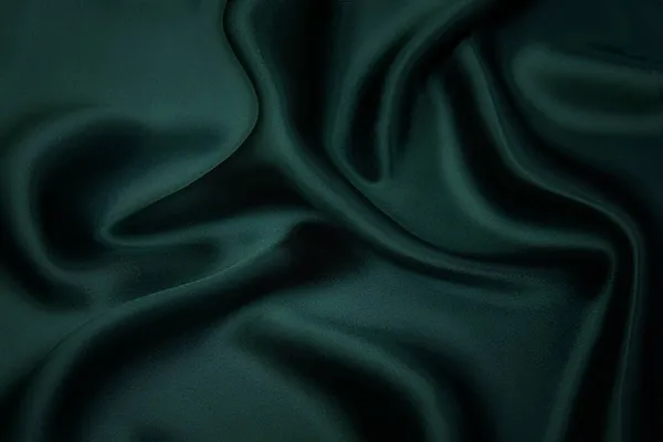 テクスチャ パターン 緑色の絹織物の質感 美しいエメラルドグリーンの柔らかい絹の生地 — ストック写真