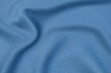 Doğal mavi kumaş ya da tidewater renginde kumaşın yakın çekim dokusu. Doğal pamuk veya keten kumaş dokusu. Mavi ya da yeşil tuval arkaplanı.