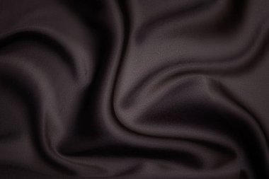 Doğal kırmızı ya da kahverengi kumaş ya da kumaşın yakın çekim dokusu aynı renkte. Doğal pamuk, ipek, yün veya keten kumaş dokusu. Kırmızı ve kahverengi tuval arkaplan.