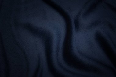 Doğal mavi kumaş ya da kumaşın yakın çekim dokusu aynı renkte. Doğal pamuk, ipek, yün veya keten kumaş dokusu. Mavi tuval arkaplanı.