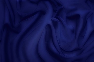 Doğal mavi kumaş ya da kumaşın yakın çekim dokusu aynı renkte. Doğal pamuk, ipek, yün veya keten kumaş dokusu. Mavi tuval arkaplanı.