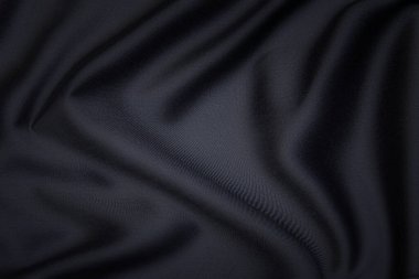 Doğal gri ya da siyah kumaş ya da kumaşın yakın çekim dokusu aynı renkte. Doğal pamuk, ipek, yün veya keten kumaş dokusu. Siyah tuval arkaplan.