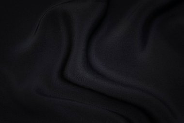Doğal gri ya da siyah kumaş ya da kumaşın yakın çekim dokusu aynı renkte. Doğal pamuk, ipek, yün veya keten kumaş dokusu. Siyah tuval arkaplan.