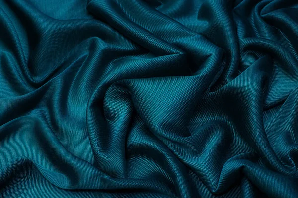 水の色で自然な青の生地や布のクローズアップテクスチャ 天然の綿やリネンの繊維素材の生地の質感 青または緑のキャンバスの背景 — ストック写真