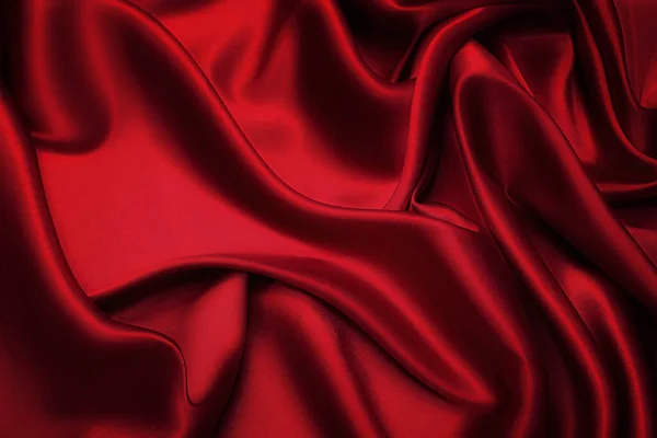 同じ色で自然な赤やピンクの生地や布のクローズアップテクスチャ 天然コットン シルクまたはウールの生地の質感 またはリネンの繊維素材 赤いキャンバスの背景 — ストック写真