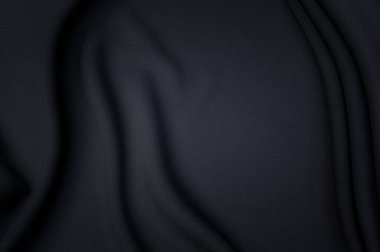 Doğal gri ya da siyah kumaş ya da kumaşın yakın çekim dokusu aynı renkte. Doğal pamuk, ipek, yün veya keten kumaş dokusu. Siyah tuval arkaplan.