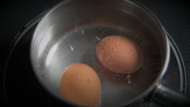 Raw Yellow Chicken Eggs Hard Boiled Metal Pot Boiling Water — Vídeo de Stock