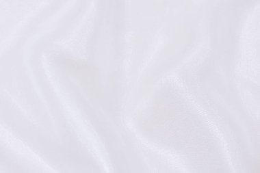 Doğal beyaz ya da fildişi kumaş ya da kumaşın yakın çekim dokusu aynı renkte. Doğal pamuk, ipek, yün veya keten kumaş dokusu. Fildişi tuval arkaplanı.