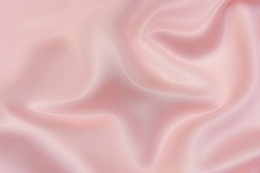 Doğal kırmızı ya da pembe kumaş ya da kumaşın yakın çekim dokusu aynı renkte. Doğal pamuk, ipek, yün veya keten kumaş dokusu. Kırmızı tuval arkaplanı.