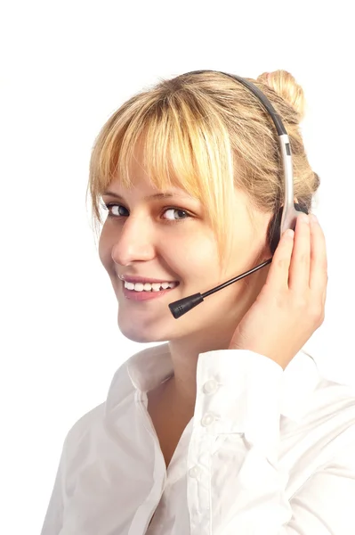 Joven chica sonriente trabajando en un centro de llamadas — Foto de Stock