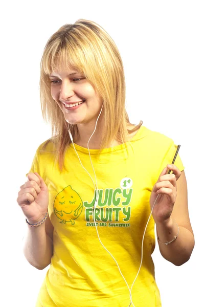 Young attractive girl dancing with a mp3 player — Stock Photo, Image