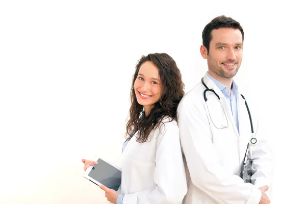 Retrato de um médico com sua enfermeira — Fotografia de Stock