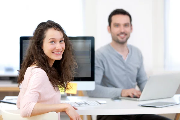 Young attractive co-worker at the office — Stock Photo, Image