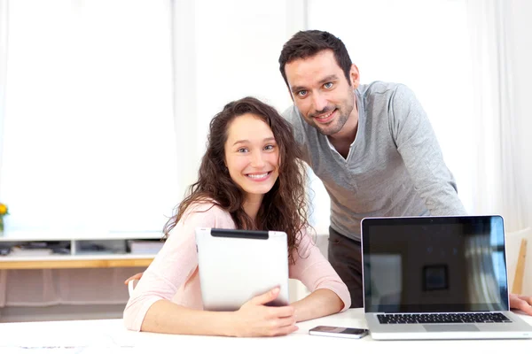 Co-workers showing their finished work — Stock Photo, Image