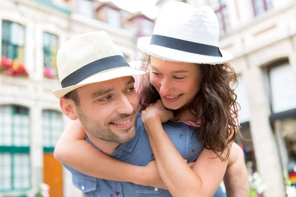 Young happy couple having fun on holidays — Stock Photo, Image