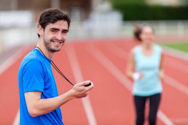 genç, çekici bir kadın eğitim spor Koç