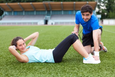 genç, çekici bir kadın eğitim spor Koç