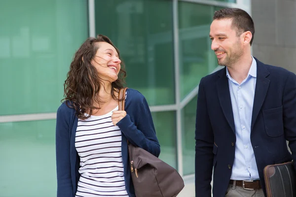 Business man and woman chatting together after work — Stock Photo, Image